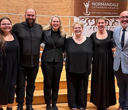 Giselle Wyers with former conducting students. 