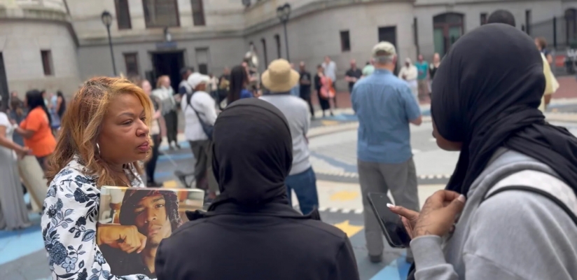 From WHYY News: Charriba Gordon honors son Stephen Hoston III at the Hearing Philadelphia event at City Hall on Saturday, March 29, 2025. (Courtesy Ryan Beppel)