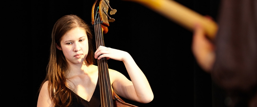 Jazz Studies major Carmen Rothwell, bass, in performance at the 2013 Improvised Music Project Festival (Photo: Steve Korn). 
