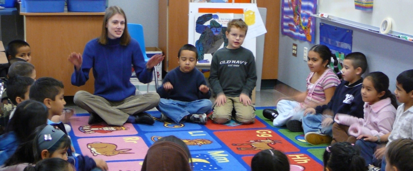 UW Music Education student working with school children in the Yakima Valley in 2009.
