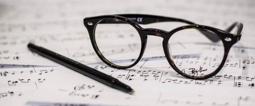 glasses on sheet music (photo: Dayne Topkin)