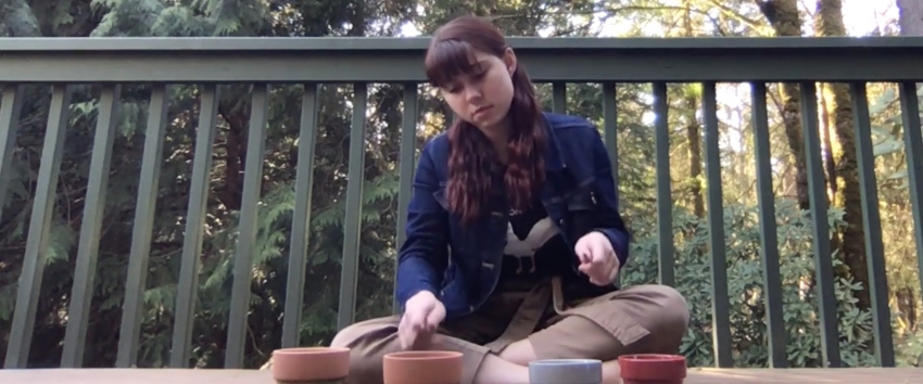 Percussion Studies student Sophia Schmidt performs a flower pot improvisation.