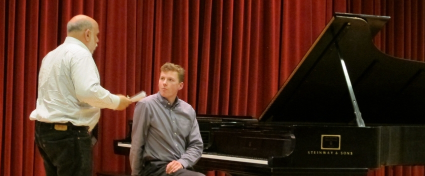 Graduate piano student Joseph Dougherty takes part in a master class with guest artist Stuart Isacoff.