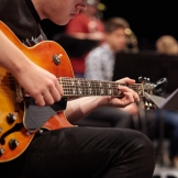 UW Studio Jazz Ensemble: Big Band, guitar player (photo: Steve Korn)