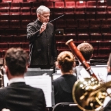 Timothy Salzman conducts the UW Wind Ensemble. 
