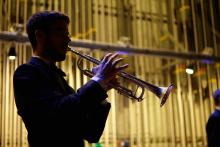 Back-lit trumpet player