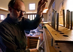 Paul Fritts working on an organ being built in his shop.