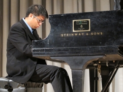 Graduate piano student Andrew Chen performs in Brechemin Auditorium.