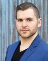 Graduate student Nick Klein, voice. 