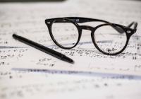 glasses on sheet music (photo: Dayne Topkin)