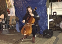 Faculty cellist Sæunn Thorsteinsdóttir performs at Tent City 3. 
