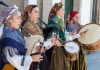 Via Getty: "A group of young women in traditional costumes play Galician music with bagpipes, tambourines and drum in the historic center during the San Froilan festivities on October 6, 2019 in Lugo, Galicia, Spain." ( Xurxo Lobato/Getty Images) 