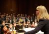 Giselle Wyers conducting the combined UW symphony and choirs (Photo: Steve Korn).