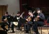 UW Guitar Ensemble students playing guitars