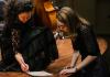 Young composers work at Benaroya Hall.