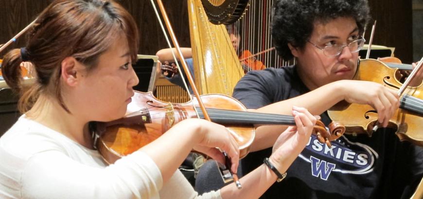 UW music students at orchestra rehearsal.