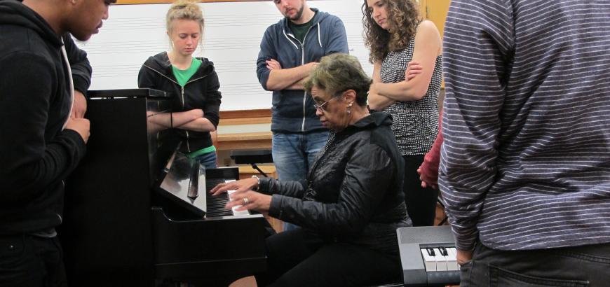 Ethnomusicology Visiting Artist Phyllis Byrdwell works with students in her Gospel Piano class.