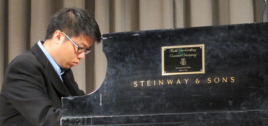 Graduate piano student Andrew Chen performs in Brechemin Auditorium.
