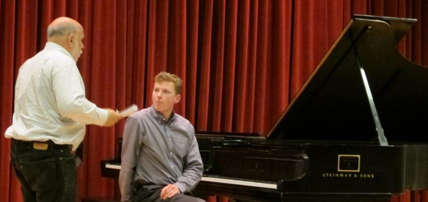 Graduate piano student Joseph Dougherty takes part in a master class with guest artist Stuart Isacoff.