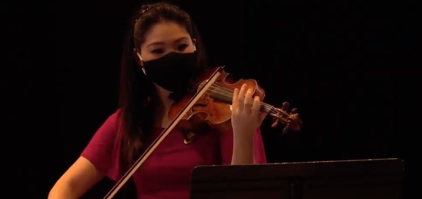 Faculty violinist Rachel Lee Priday performing masked at Meany Hall (Photo: School of Music).