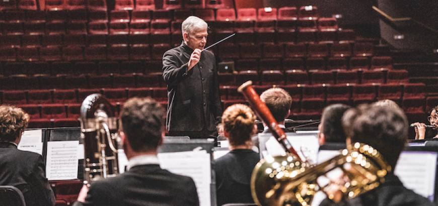 Timothy Salzman directs the UW Wind Ensemble.
