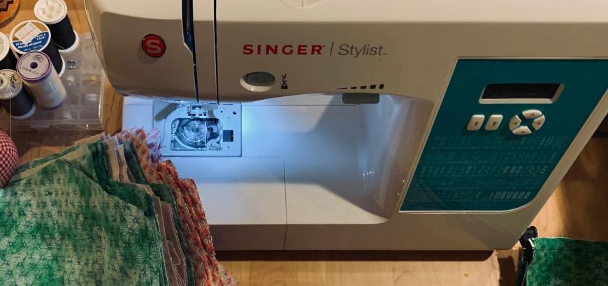 Making masks on the Singer sewing machine.