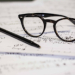 glasses on sheet music (photo: Dayne Topkin)