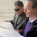 Professors Joël-François Durand (right) and Larry Starr peruse the score of Durand's new commission for Seattle Symphony (Photo: Joanne DePue). 