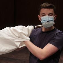 Wind Ensemble members adjusted to extra layers of protection for Autumn Quarter in-person rehearsals at Meany Hall (Photo: Gary Louie). 