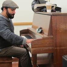 Ethnomusicology Visiting Artist Phyllis Byrdwell works with students in her Gospel Piano class.