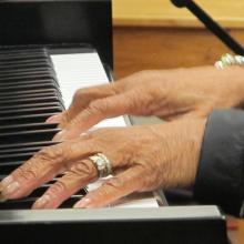 Ethnomusicology Visiting Artist Phyllis Byrdwell works with students in her Gospel Piano class.