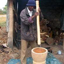 Man pounding